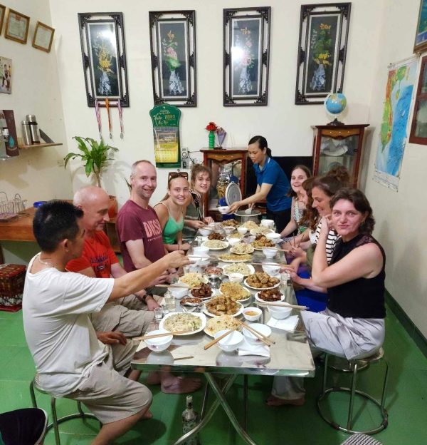 A full table of home-cooked dishes at a family dinner in Ninh Binh